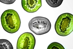 Photograph of limes taken on a sheet of clear plastic which was held over a soft-box to create a bright white background.